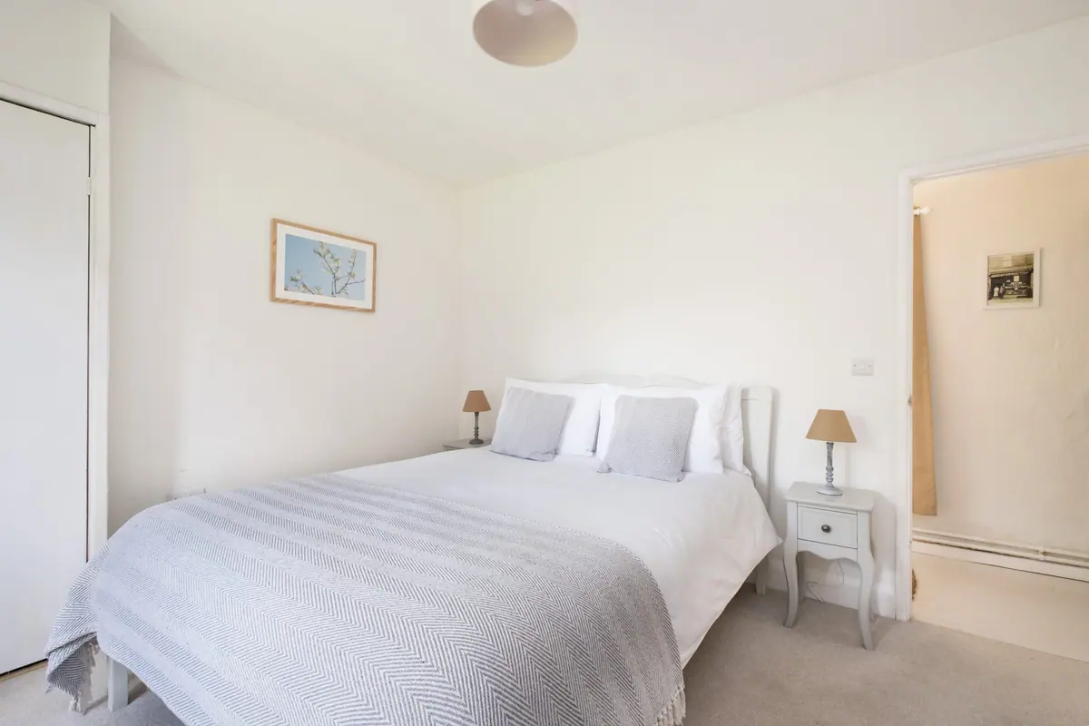 A double bedroom with bedside lamps